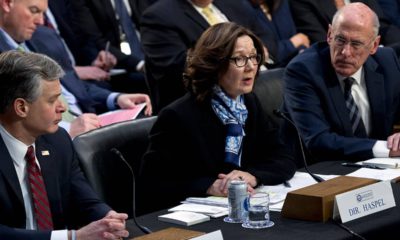Photo of Gina Haspel accompanied by FBI Director Christopher Wray and Director of National Intelligence Daniel Coats