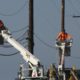 Photo of utility crews repairing overhead lines along the PCH