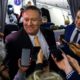 Photo of Mike Pompeo talking to reporters