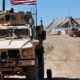 Photo of a US soldier sitting in an armored vehicle