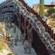 Photo of border wall in Arizona covered in razor wire