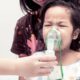 Photo of child with inhaler mask