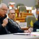 Photo of Mike Heal, left, police chief for the city of Aztec, N.M.