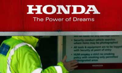 Photo of security guards at the entrance of a Honda car plant in Swindon