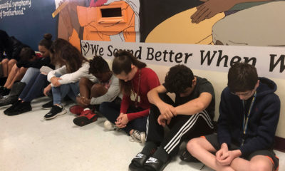 Photo of students taking a moment of silence