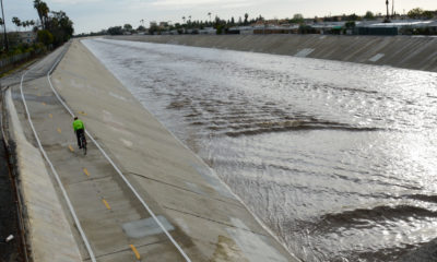 A photo of swollen Coyote Creek in Cypress, California