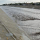 A photo of swollen Coyote Creek in Cypress, California