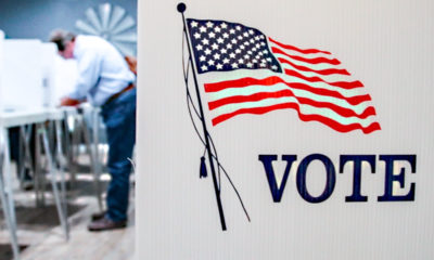 Voter casts a ballot at local precinct in Fresno County during 2018 General Election