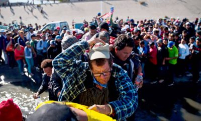 Photo of migrants crossing the river at the US-Mexico border