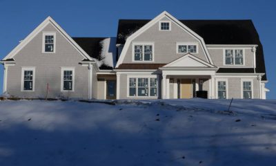 Photo of a home surrounded by snow in Natick, Mass.