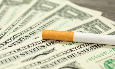Photo of cigarette and money