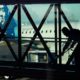 Photo of worker cleaning a jet bridge