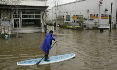 Photo of a man on a paddle board