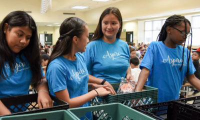 Fresno Unified students collect surplus food from the cafeteria after lunch as part of the district's Food to Share partnership.