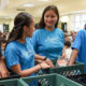 Fresno Unified students collect surplus food from the cafeteria after lunch as part of the district's Food to Share partnership.