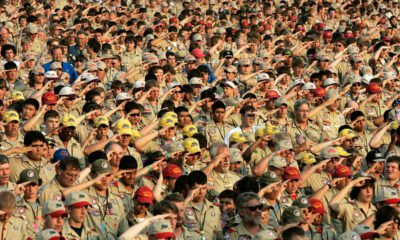 Photo of boy scouts saluting
