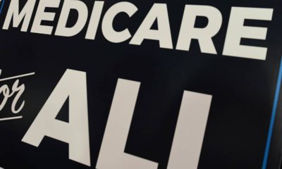 Photo of a sign stating "Medicare for All"