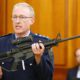 Photo of Mike McIlraith showing an AR-15 style rifle