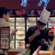 Photo of worker at the imported beef section of a supermarket