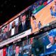 Photo of video screens in a betting lounge