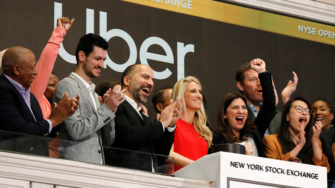 Photo of Uber CEO attending the opening bell ceremony