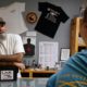 Photo of gun shop owner and customer