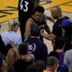 Photo of Kyle Lowry gesturing next to referee Marc Davis at Game 3 of the NBA Finals in Oakland, CA.