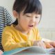 Photo of a girl reading