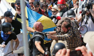 Photo of white nationalist demonstrators clashing with counter demonstrators