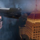 Composite photo of a handgun and downtown Fresno