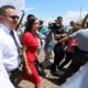 Rep. Alexandria Ocasio-Cortez being escorted after touring the Border Patrol station in Clint, Tx.