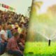 Composite of a large gathering of Clovis residents and a lawn sprinkler illustrating water for future growth