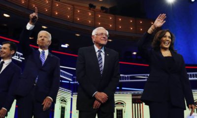 Photo of Democratic presidential candidates before the start of the Democratic primary debate