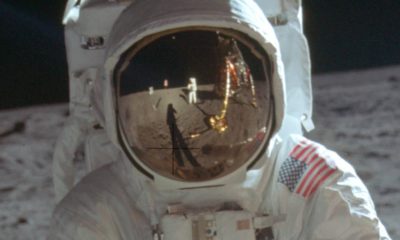 Photo of astronaut Neil Armstrong reflected in the helmet of Buzz Aldrin