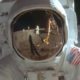 Photo of astronaut Neil Armstrong reflected in the helmet of Buzz Aldrin