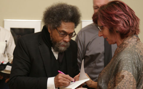 Cornel West signs autographs after a speech at Fresno City College on Aug. 27, 2019 (GV Wire/Jahz Tello)