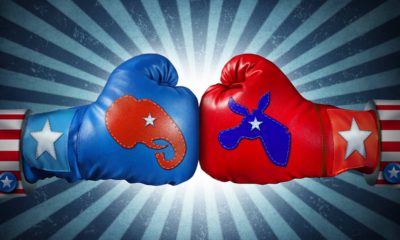 Illustration of gloves representing the Democratic and Republican partiesppo