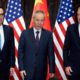 Photo of Chinese Vice Premier Liu He, center, posing with U.S. Trade Representative Robert Lighthizer, right, and Treasury Secretary Steven Mnuchin
