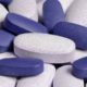 Photo of blue and white pills