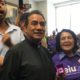 Photo Derek Smith and Dolores Huerta protesting