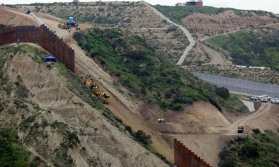 Photo of border wall construction in San Diego