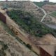 Photo of border wall construction in San Diego
