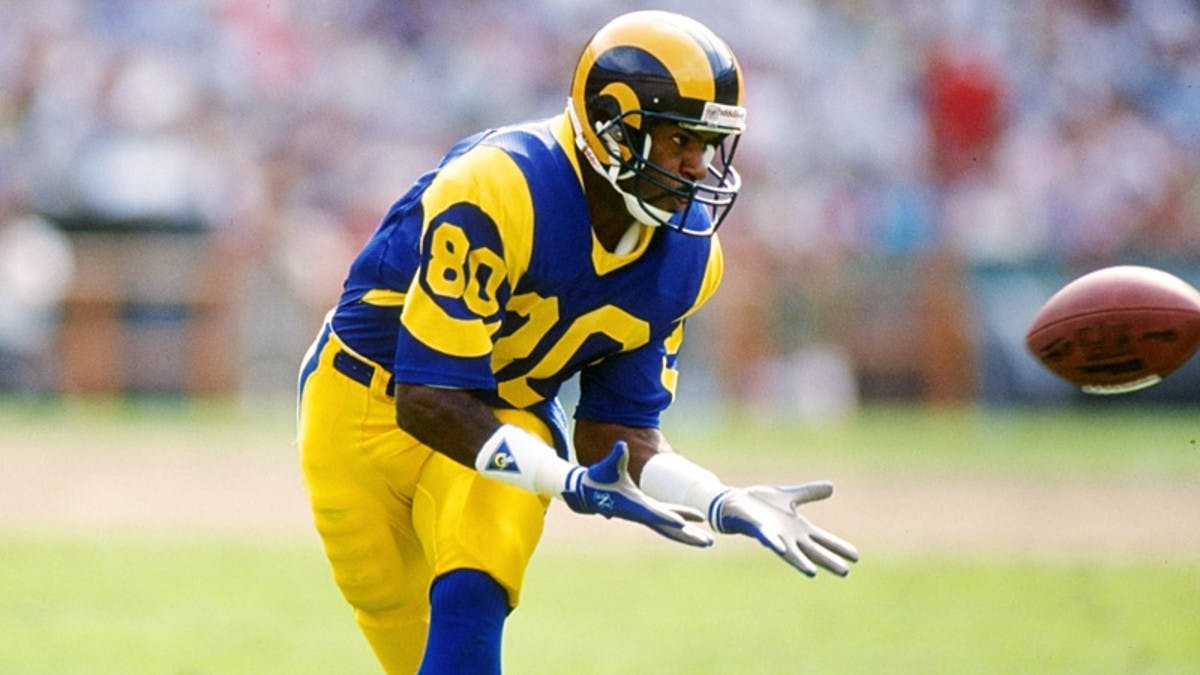 Photo of Henry Ellard preparing to catch a football in a Los Angeles Rams uniform