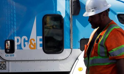 Photo of PG&E worker and PG&E truck