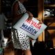 Photo of people handing out signs before a rally