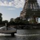 Photo of a SeaBubble going past the Eiffel Tower in Paris