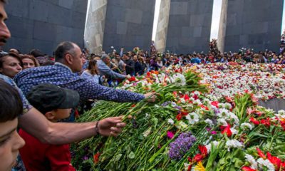 Photo of Armenians placing flowers at Armenian genocide memorial in Yerevan, Armenia
