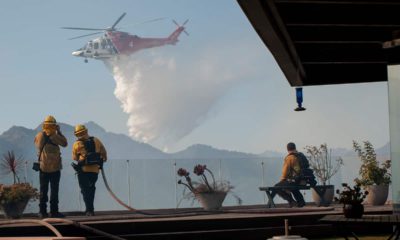 Photo of helicopter dropping water