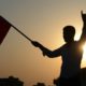 Photo of someone holding a Turkish flag