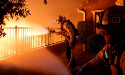 Photo of LA County firefighters battle the Saddleridge fire